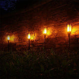 FancyGrab 4Pcs Hollow Carved Solar Light Flickering Flames Torch Lights Patio Walkway Lamp Outdoor Garden Landscape Decor Lights